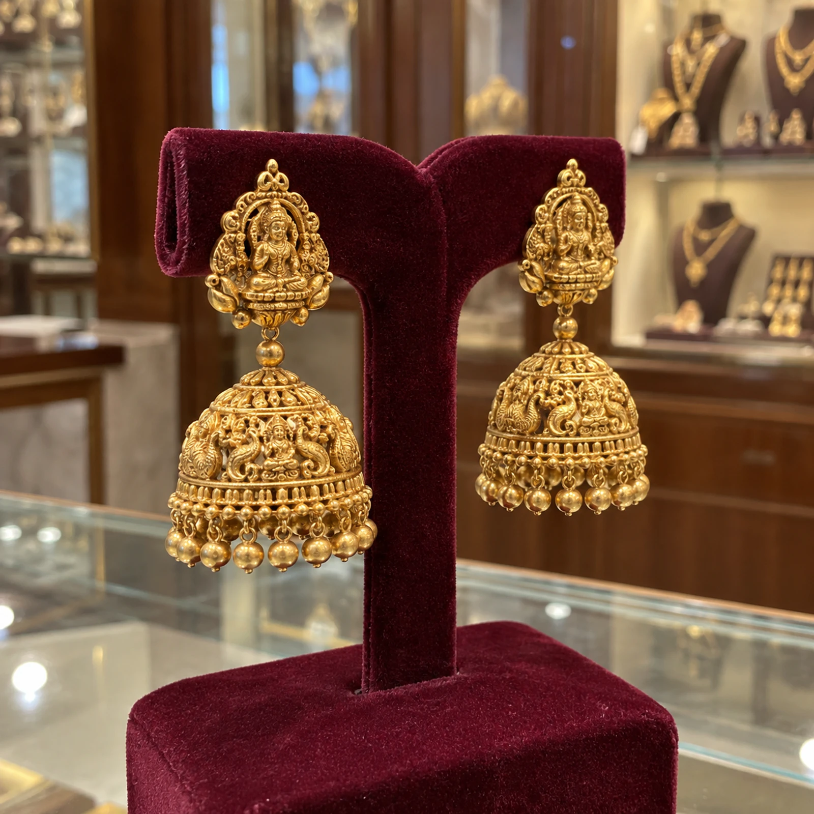 Aarohi Temple Gold Jhumkas jewellery design